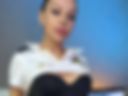 Sexy stewardess in stockings seduces with legs and big labia