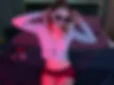 chewing gum in mouth, sunglasses on face