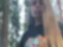 Playing with boobs in the woods