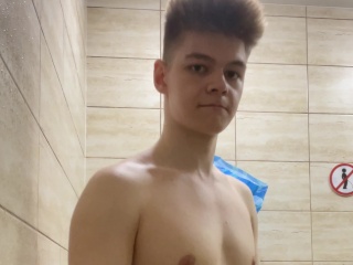 Flexing in a gyms shower