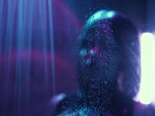 In the quiet solitude of the shower, the android finds a moment of respite from the demands of its programmed existence.
