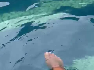 My feet on the pool