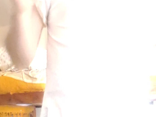 in a nightgown and black tights with a hole