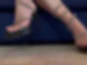 Feet in heels and cross one's legs