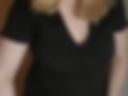 A little black dress on a curvy blonde