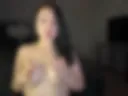 Massage of naked tits using oil