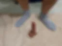 I stroke a dildo with my dark blue socked feet and show off my little penis.