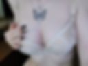 I caress my breasts