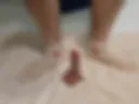 I stroke a dildo with my cream socked feet and show off my little penis.
