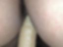 Riding a dildo