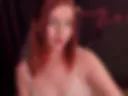 WHITE LINGERIE SMOKING REDHEAD WITH PIERCED NIPPLES