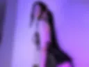 A cute succubus's striptease in latex