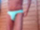 A beautiful tan. The beach. A changing cabin.