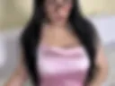 a masturbating hand in a pink dress.