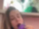 Playing with a dildo