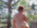 In the woods with a ponytail