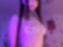 Long braids and a cute dance while taking off her swimsuit