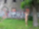 Nude walking in the city