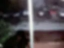 CCTV footage of me walking naked down the street in the courtyard of a building.