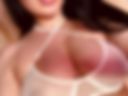 A wet bra on her tits