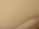 I'm caressing my pussy with a vibrator.