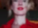 Striptease blonde in red