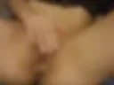 With fingers trembling