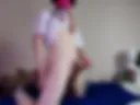 Pink masked pup jerks his bone on the bed