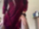 Striptease in red dress