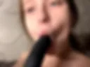 Sucking dildo and masturbating