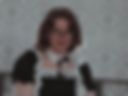 A maid tests out a large dildo with her ass.