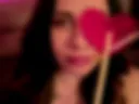 Sexually licking a lollipop