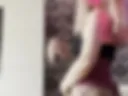 Shaking ass in fishnet stockings.