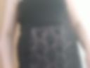 Black knitwear on a slightly tanned body in July 2025