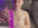 Oiled tittyjob with dildo