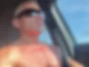 Masturbating fully nude while driving in broad daylight