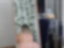 The horsewoman in the back
