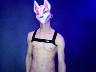 Dancing naked in a neon mask