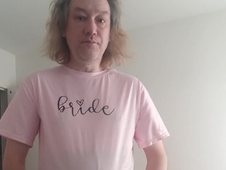 In a pink T shirt and dark tights