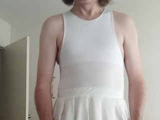 In a bodysuit and a white skirt, the dart cums in streams and a fountain