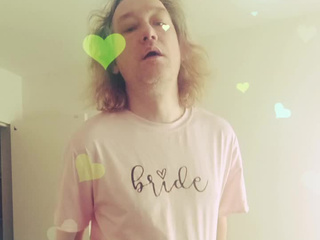 In tights and a pink T shirt with hearts around it