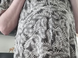 On a stump in a shirt