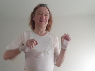 In a bodysuit and a white miniskirt