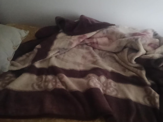 Lying in a red shirt