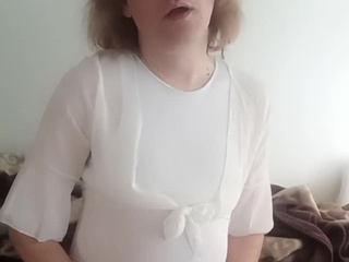 Sitting in a bodysuit and white panties with frills