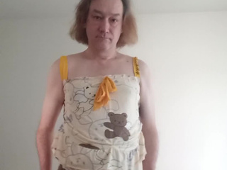 In a nightgown with teddy bears