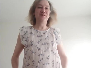 In a sundress and knee socks, naked