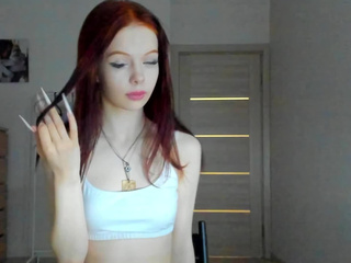 Playing with my red hair and air kiss