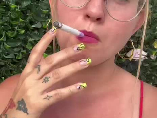 A little smoke, an intense gaze, and plenty of attitude Do you dare to keep watching?