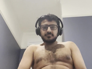 Stroking my dick while sitting on a chest of drawers
